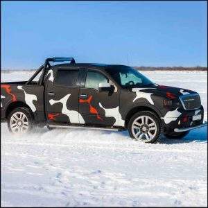Ford F-150 driving on the snow