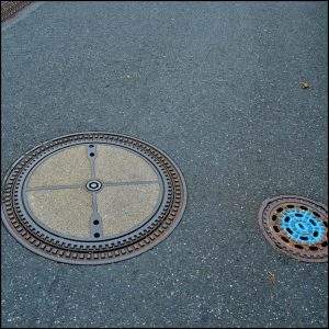 two manhole covers