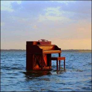 Upright Piano at ocean